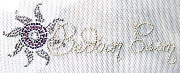Bedoon Essm white beads with sunflower logo