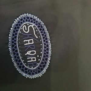 Blue and Grey Oval Arabic Logo