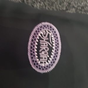 Purple Oval Arabic Logo