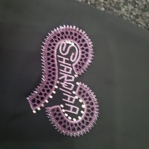 Purple Emb Arabic Logo